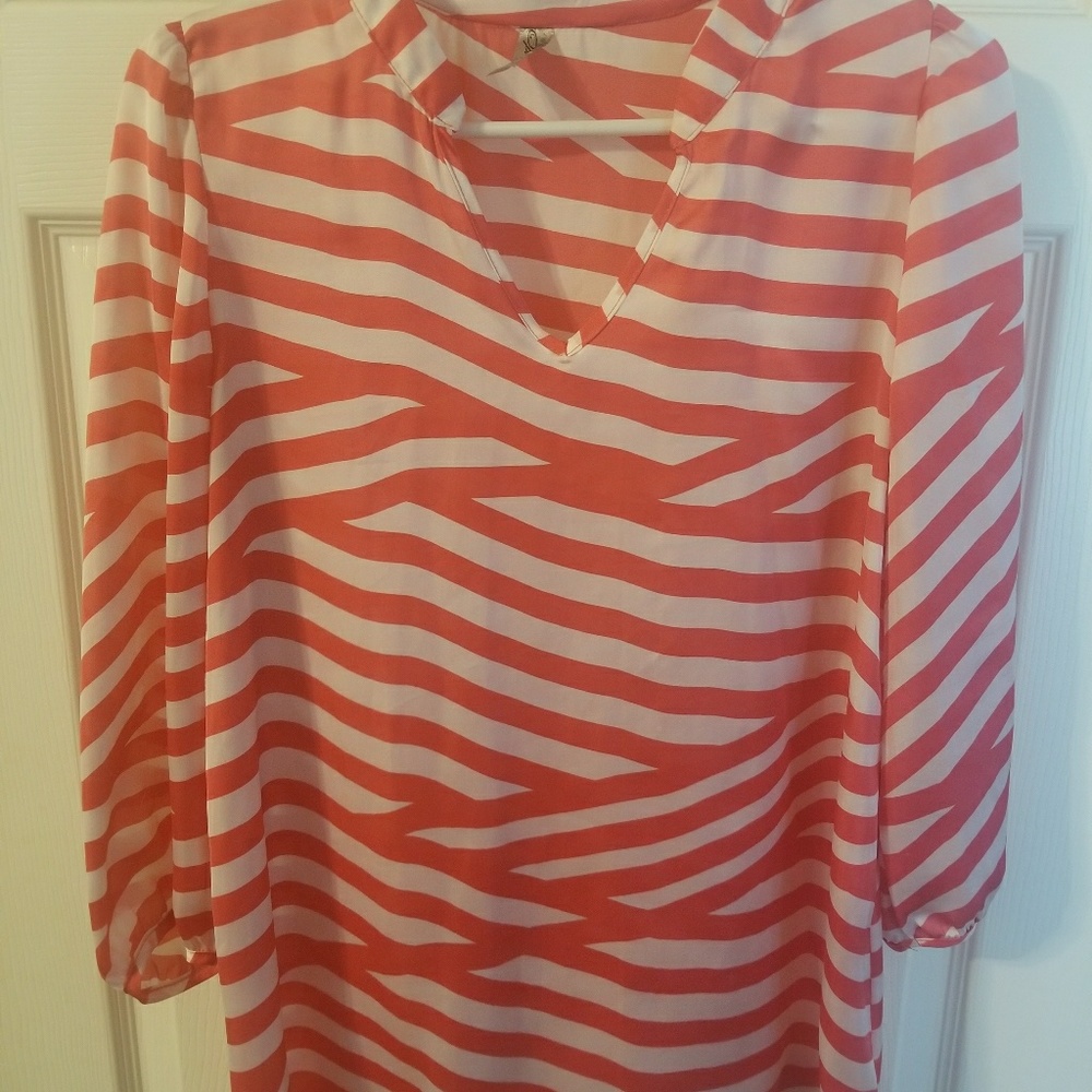 Coral and white blouse